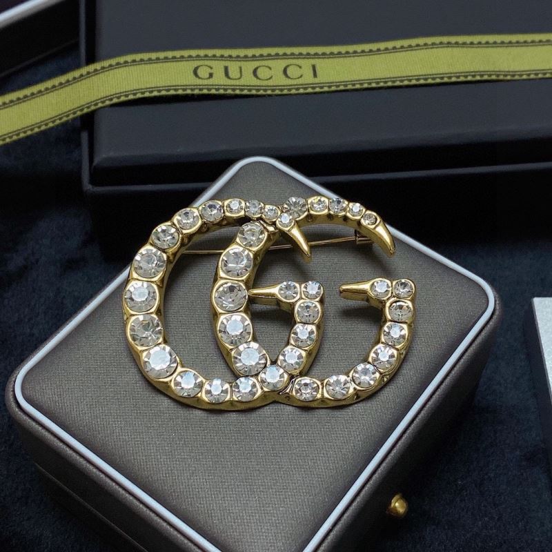 Gvc*1 brooches